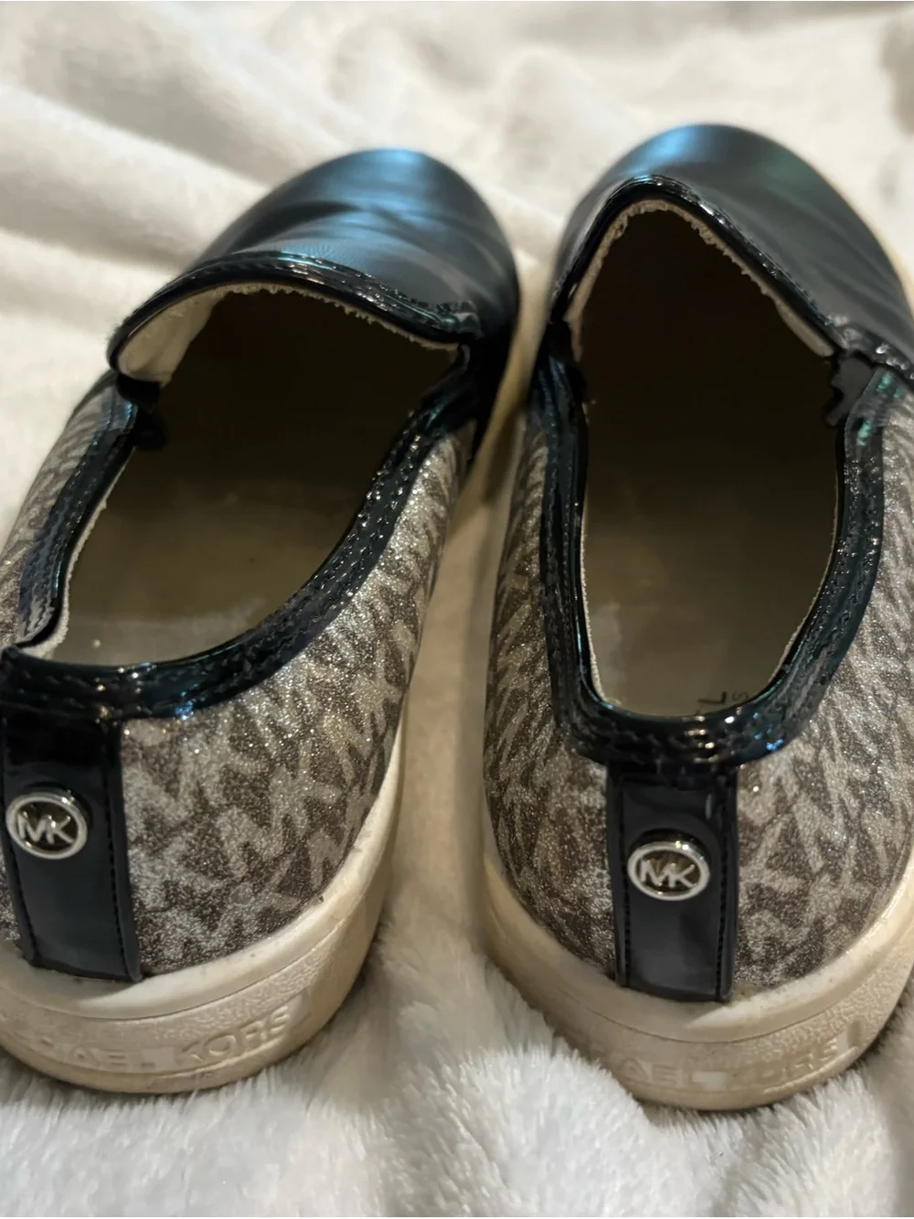 Michael Kors Black Slip-On Sneakers with Metallic MK Monogram